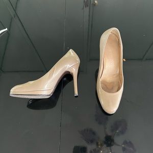 Stuart Weitzman gold pumps